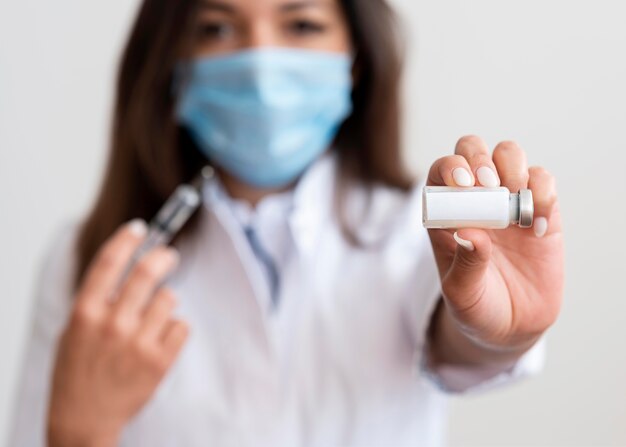 doctor preparing medical vaccine