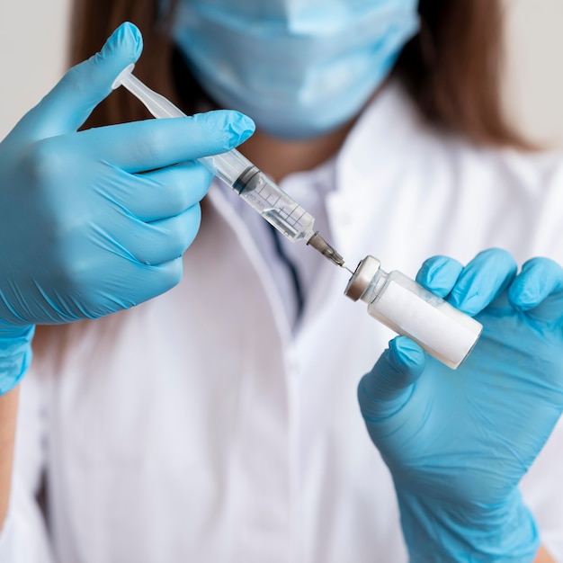 Doctor preparing medical vaccine