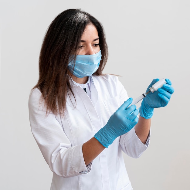 doctor preparing medical vaccine
