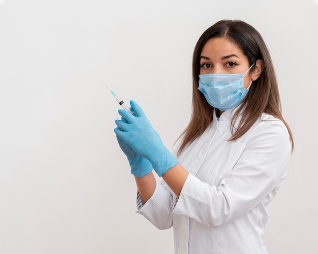 doctor preparing medical vaccine