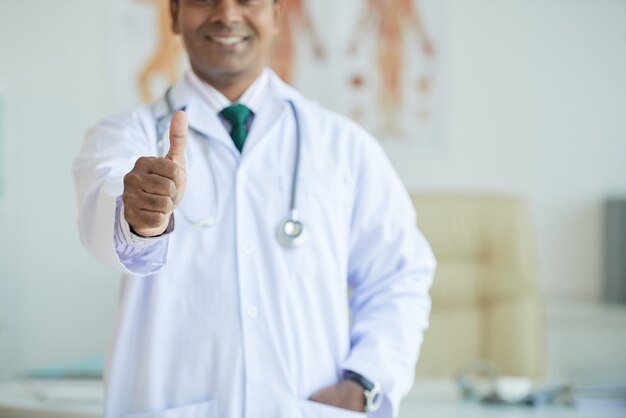 Doctor Standing With Thumb Up  Horizontal Medium Shot
