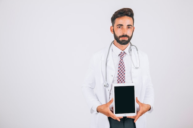 Doctor, tablet's screen and copy space