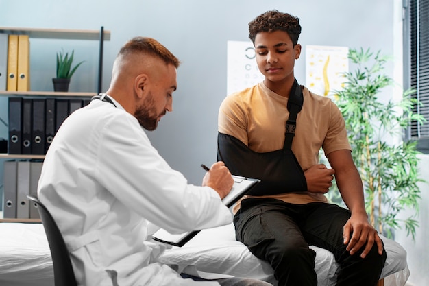 Doctor taking care of afro-american child