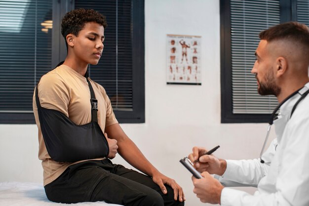 Doctor taking care of afro-american child