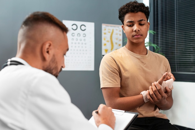 Doctor taking care of afro-american child