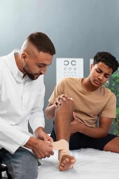 doctor taking care of afro-american child