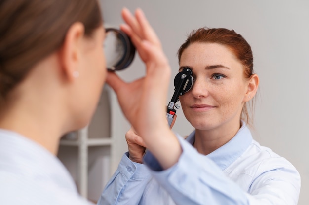 Doctor testing patient eyesight