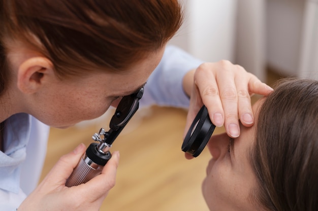 Doctor testing patient eyesight