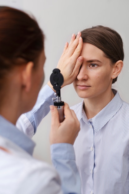 Doctor testing patient eyesight