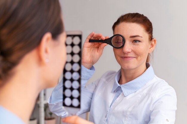 Doctor testing patient eyesight