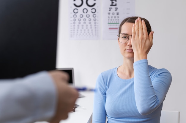 Doctor testing patient eyesight