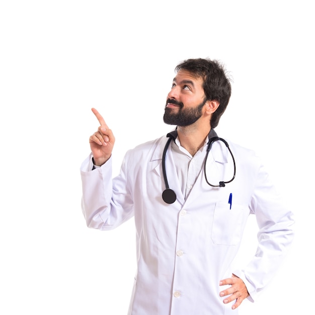 Doctor thinking over isolated white background