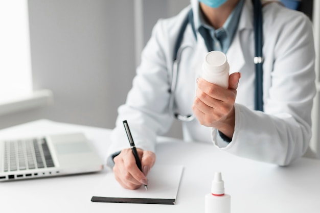 Doctor wearing face mask at the clinic