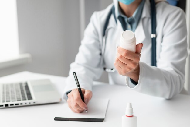 doctor wearing face mask at the clinic