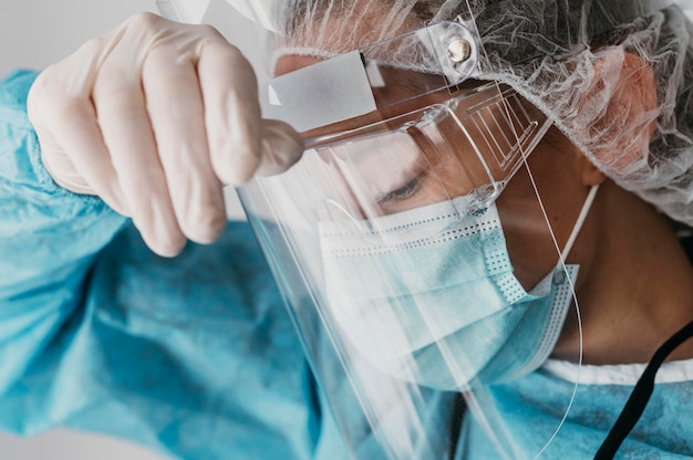 Doctor wearing protective equipment