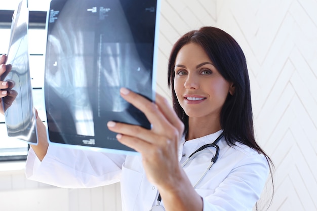 Doctor wearing white robe and stethoscope