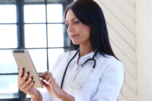 Doctor wearing white robe and stethoscope