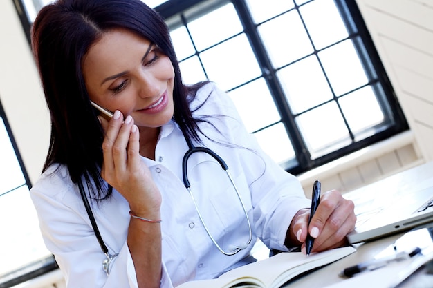 Doctor wearing white robe and stethoscope