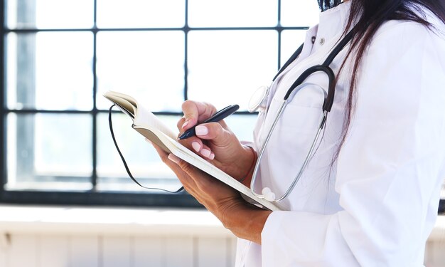 Doctor wearing white robe and stethoscope