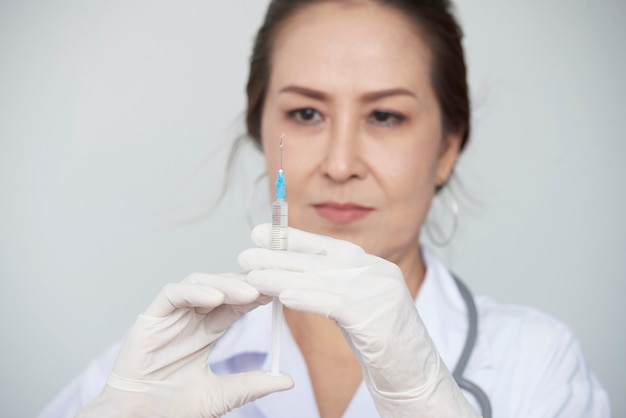 Doctor with syringe