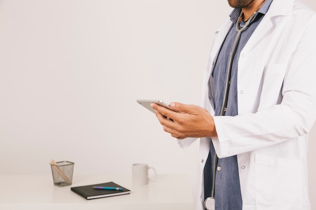 Doctor working with tablet