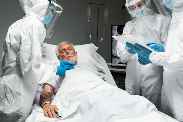 Doctors checking patient close up