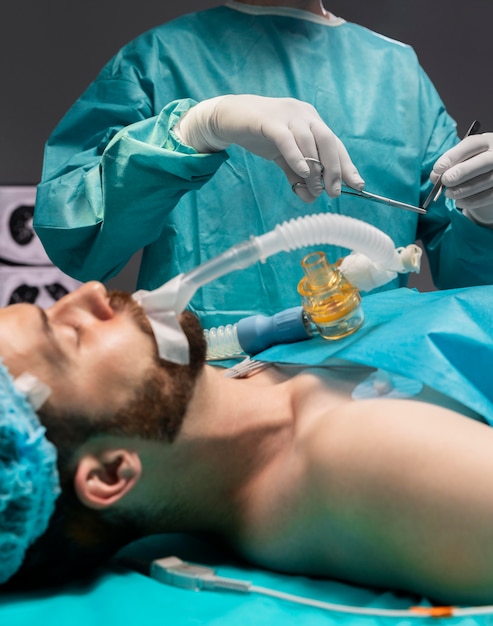 Doctors doing a surgical procedure on a patient