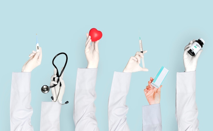 Free Photo doctors hands holding medical care objects