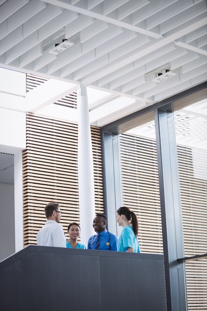 Free Photo doctors and nurse interacting with each other