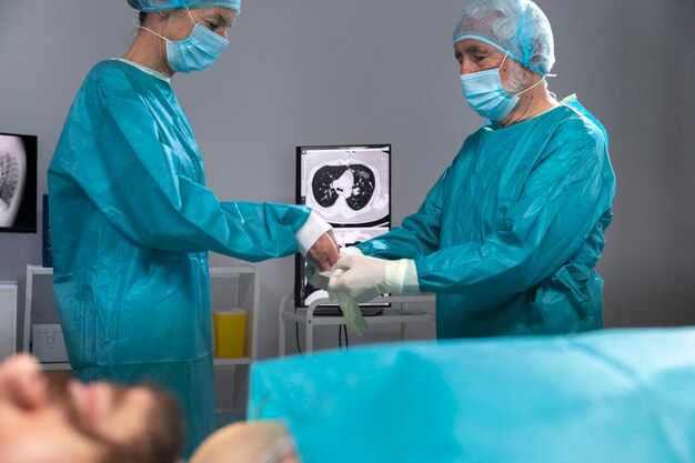 Doctors preparing for a surgical procedure