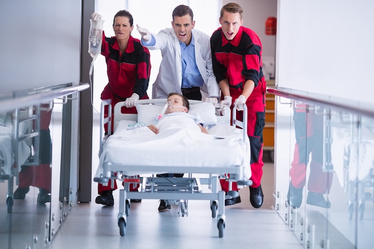 Free Photo doctors pushing emergency stretcher bed in corridor