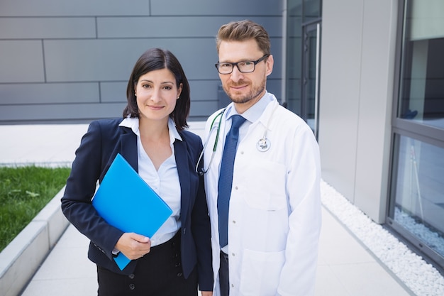 Doctors standing together in hospital premises