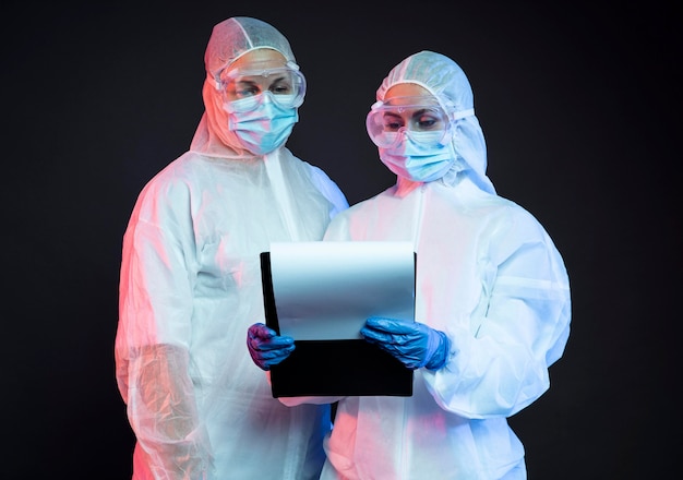 Doctors wearing protective medical equipment