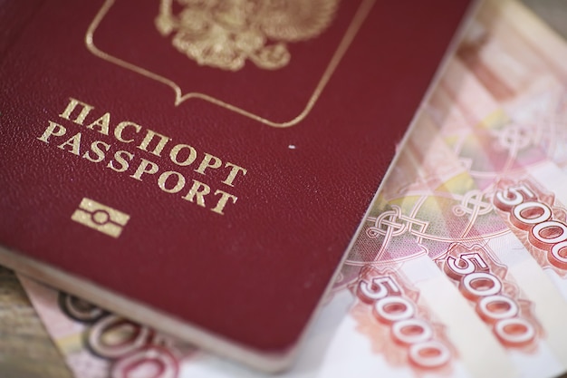 Документы и деньги на полу паспорт рф и валюта