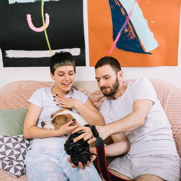 Dog with owners during the morning