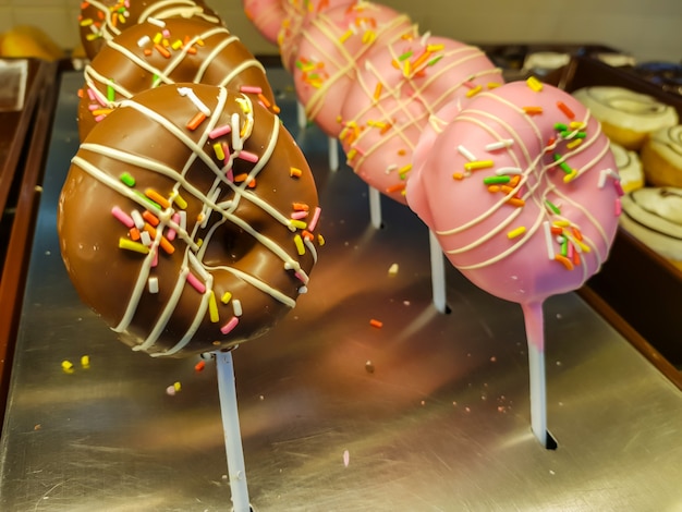 Donut with chocolate and peanut .