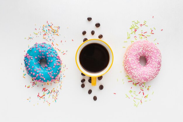 Donuts and coffee in flat lay