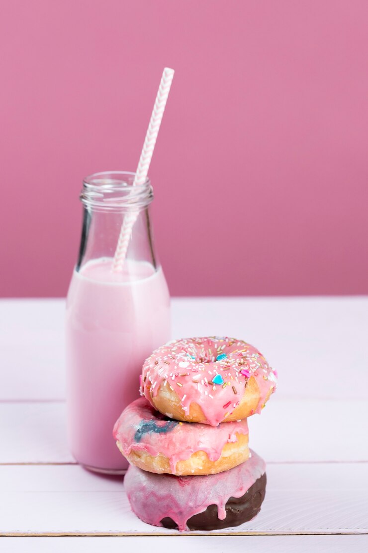 Free Photo donuts and strawberry milkshake