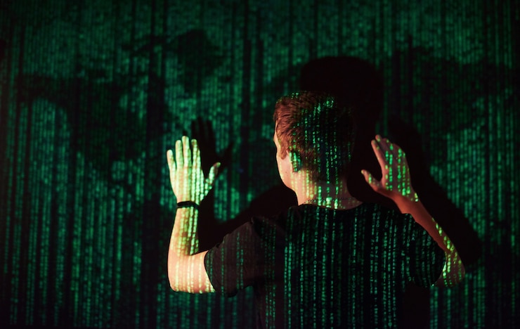 Free Photo double exposure of a caucasian man and virtual reality vr headset is presumably a gamer or a hacker cracking the code into a secure network or server, with lines of code, united states