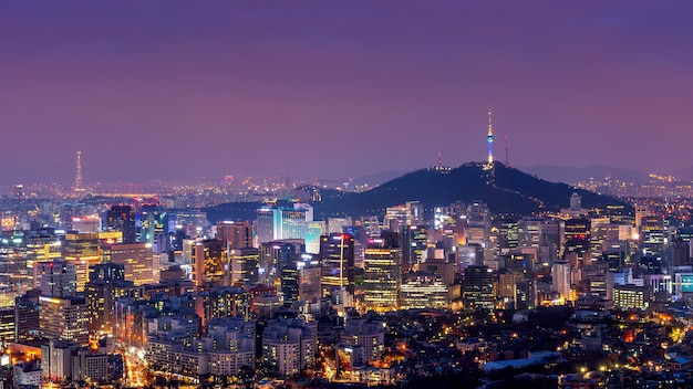 Downtown cityscape at night in Seoul, South Korea.