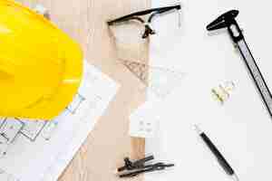 Free photo drafting supplies around toy house