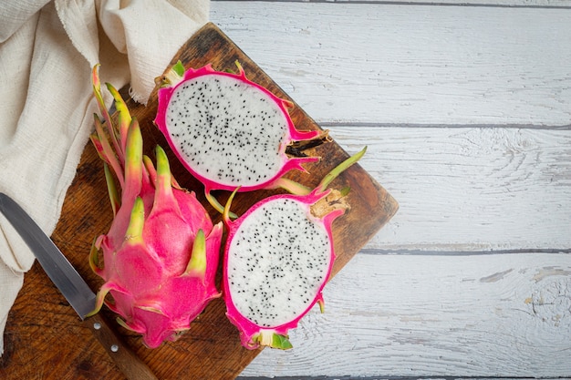 Dragon Fruit On Old Wood Background