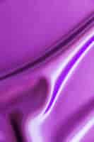 Free photo drape of smooth purple satin background