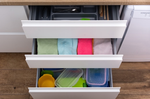 Drawer with cutlery, kitchen towels and lunch boxes