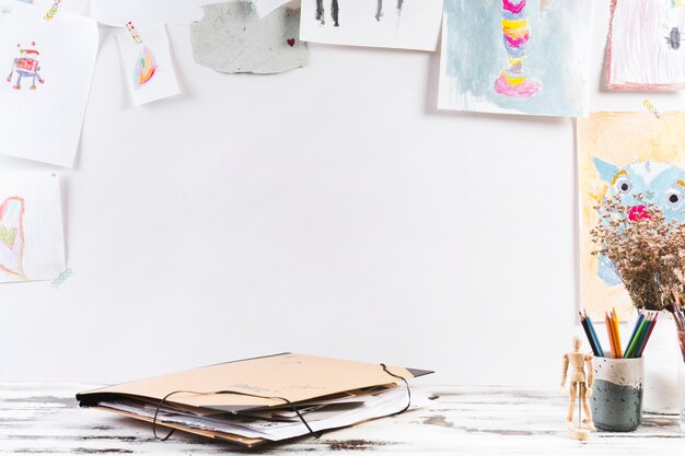 Drawing table with paper folder