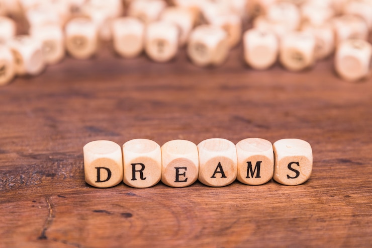 Free Photo dream word on wooden cubes