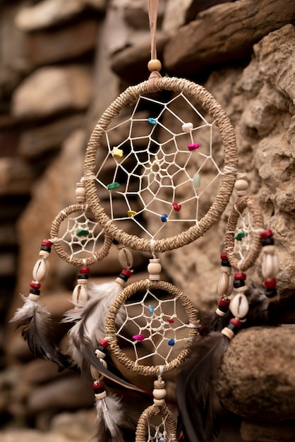 Dreamcatcher hanging from a rock