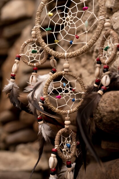 Dreamcatcher hanging from a rock