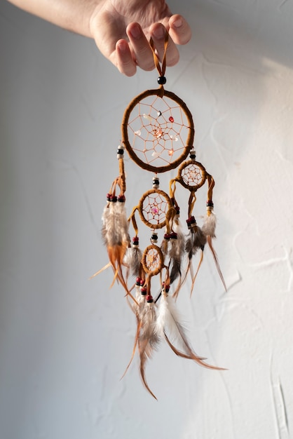 Dreamcatcher held by one hand