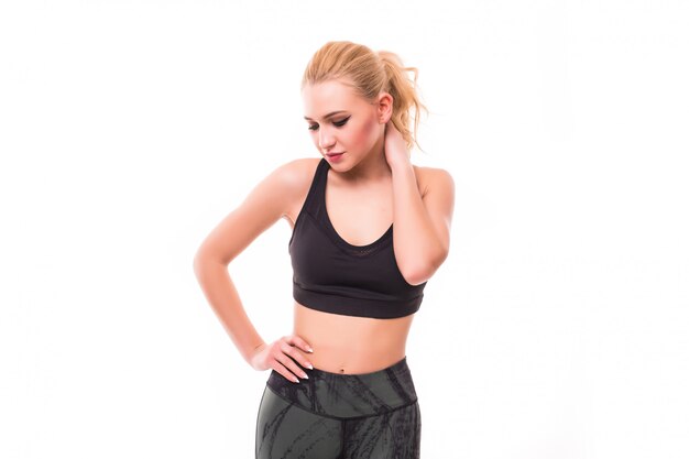 Dreaming Beautiful girl in black sportswear stay isolated on white
